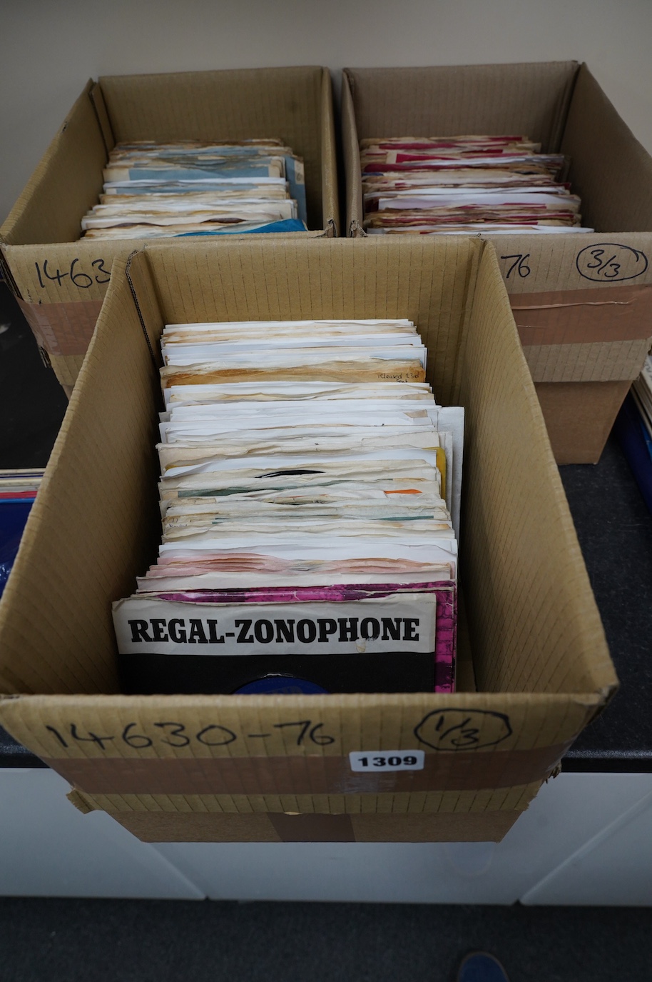 Three boxes of 7” singles on London, RCA, United Artists, Warner Brothers, Regal, Reprise, etc. labels, artists including; Jack Scott, Elvis Presley, Neil Sedaka, The Everly Brothers, Joe Cocker, Rolling Stones, etc. Con